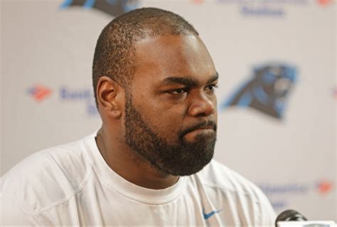 Judge ending conservatorship between former NFL player Michael Oher and 'The Blind Side' couple