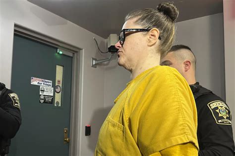 Judge rejects plea for Pennsylvania woman charged with killing 2 children found hanging in basement