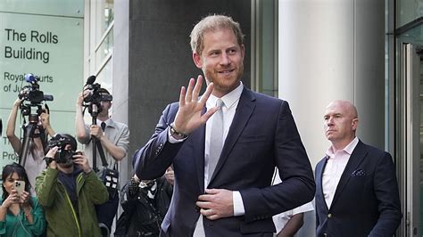 Judge says a tabloid publisher hacked Prince Harry’s phone and awards him 140,000 pounds in damages