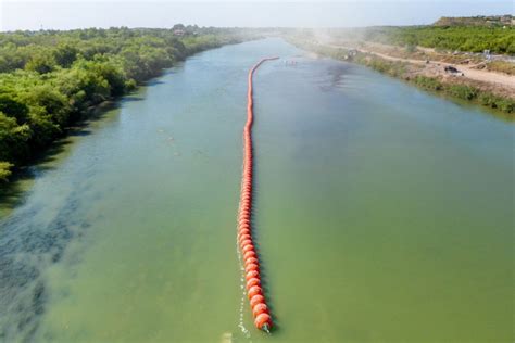 Judge to consider whether Texas can keep oversize buoy barrier on US-Mexico river border