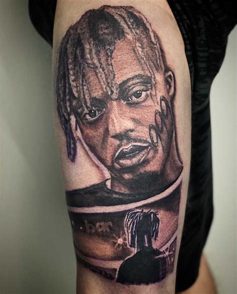 Juice wrld tattoo. Dec 2, 2021 · JUICE Wrld, whose real name was Jarad Higgins, was an American rapper who tragically died in December 2019 at age 21. The star had 15 different tattoos, including 999 inked across his left wrist and on top of his right hand. 