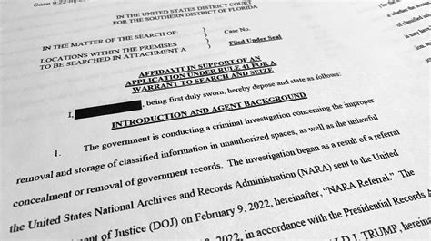 Justice Department releases slightly less redacted Trump warrant affidavit