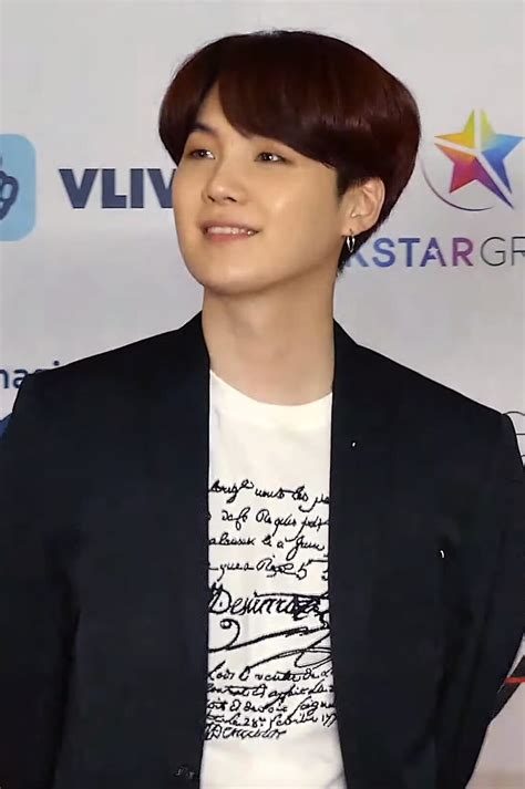 K-pop star Suga becomes 3rd BTS member to begin military service in South Korea