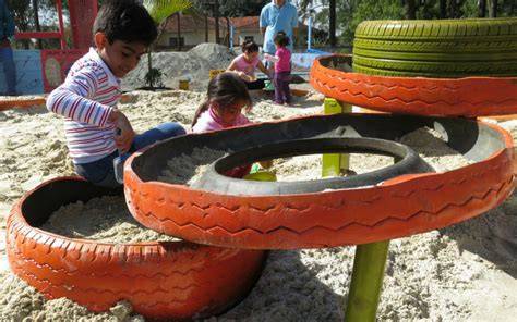 Kids Playground Made from Recycled Tires - raincitystudios.com