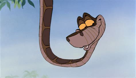 Kaa the snake hypnotizes Mowgli in an attempt to eat him.