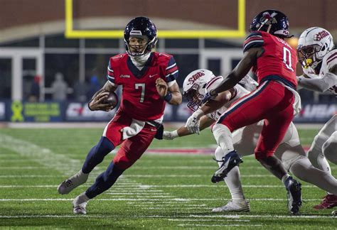 Kaidon Salter leads unbeaten No. 20 Liberty past New Mexico State 49-35 for C-USA title