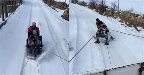 Kamyonet arkasına bağladıkları tekerlekle karda kaymanın keyfini yaşadılars