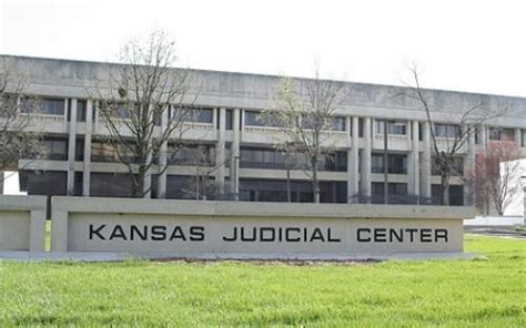 Kansas’ top court says a GOP election law is vague and revives a lawsuit against it