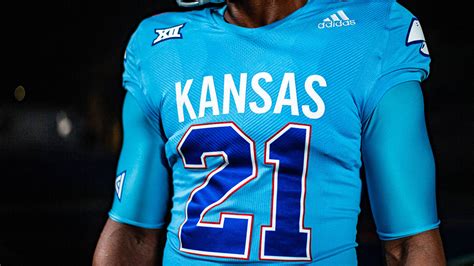 Kansas Jayhawks #18 NCAA Adidas Youth Blue Official Football Replica Jersey. $17.49. Was: $60.00. . 