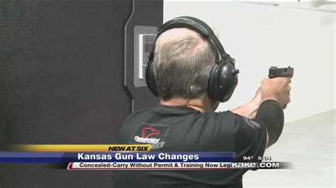 Under Kansas law, a person may transport a loaded firearm in a vehicle without any permit required, regardless of whether the loaded firearm is stored in a …