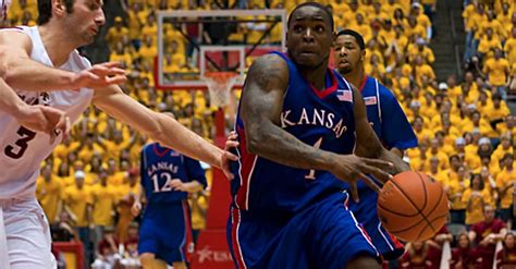 Kansas point guard. Not only is he the starting point guard for a team that surprisingly won 23 games and earned a No. 3 seed in the NCAA Tournament, but he is also a third-team All-American and first-team All-Big 12 ... 
