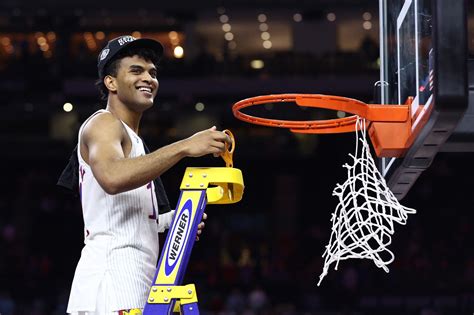 Kansas guard Remy Martin celebrates after their win against North Carolina in a college basketball game at the finals of the Men's Final Four NCAA tournament, Monday, April 4, 2022, in New Orleans .... 