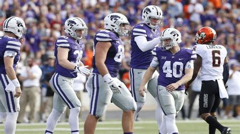 Kansas state football kicker. First quarter: Oklahoma State scores for 10-0 lead. A 2-yard run by Ollie Gordon, who bounced outside when an inside run was stuffed, put the Cowboys up 10-0 with 7:19 left in the first quarter. 