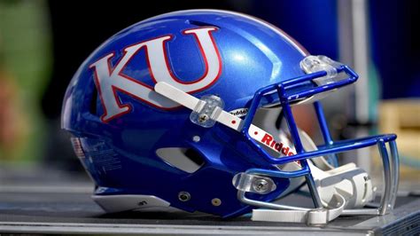 The Jayhawks drove down and made it a one-score game again, scoring a touchdown on a 28-yard pass from Jalon Daniels to Luke Grimm. The extra point made it a 28-21 lead for TCU with 9:23 left.. 