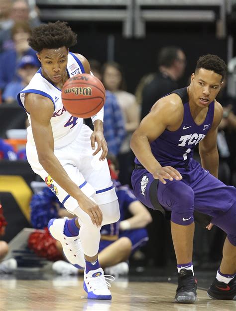 TCU center Eddie Lampkin Jr. (4) tries to steal the ball from Kansas State forward Nae’Qwan Tomlin (35) during the first half of an NCAA college basketball game Tuesday, Feb. 7, 2023, in .... 