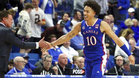 Kansas vs. Texas Tech score: No. 5 Jayhawks survive scare from No. 13 Red Raiders in double-overtime thriller. Kansas guard Ochai Agbaji scores a career-high ….