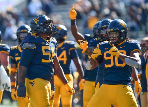 Kansas’ football team defeated West Virginia 55-42 in overtime on Saturday in the first Big 12 Conference game of the season for both teams ... West Virginia cut the gap to two points, 42-40, on .... 