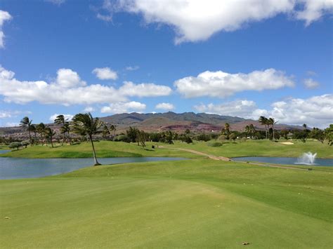 Kapolei golf course. Kapolei Golf Course ft. Book Now. From: $155.00. 18 holes, par 72, 7001 yards. All prices per person and include range balls and golf cart rentals. Located west of Pearl Harbor in sunny Kapolei, the par-72 championship layout is beautifully landscaped with floral gardens, thousands of coconut palms and five expansive lakes. 