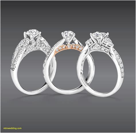 Kay jewelers website. Round center diamond creates a beautiful engagement ring for her. Total diamond weight is 3/8 carat. Crafted in 10K White Gold. The ring features diamond as head stones. 