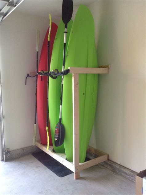 Kayak garage storage. The typical dimensions of a garage depend highly upon the intended use. Making the assumption that the garage will be for two cars and include space for some storage, the typical d... 