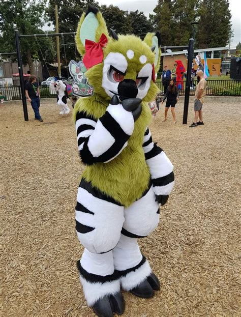 Each suit is made from thick, high quality, faux fur, and is double stitched with a straight stitch and zig-zag stitch in all high-stress areas. In order to reduce exhaustion and heat build up inside the fursuit, lightweight breathable pollyfill is used for the padding, as well as lightweight foam and a sewn in balaclava for the head. Feetpaws .... 