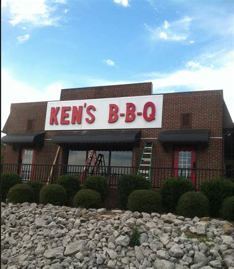 Kens bbq. Wow wow wow. BEST BBQ EVER. Very impressed. I have had my fair share of bbq but this by far the best I have ever had. Located on the side of the road in a parking lot (like it should be), this bbq place will blow your mind. I had the sampler ($14) so I can taste everything possible. My fav was the pulled pork- perfect flavor and so moist but ... 
