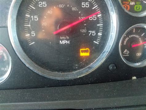 A yellow/amber light indicates the temperature of the transmission. It's a toothed circle with a thermometer inside. When the transmission system overheats, this light flashes on the Kenworth dashboard. A low transmission fluid level or a cooling system mechanical issue might cause this to illuminate as well. ‍.. 