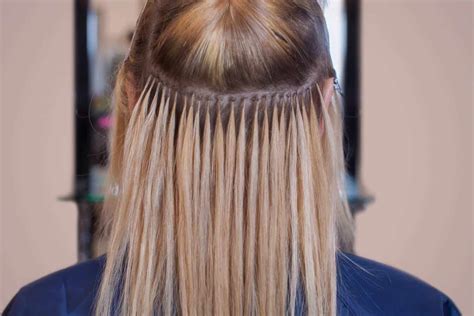 Keratin bond hair extensions. They are practically unnoticeable because the bonds are so small that they are completely hidden under the hair. Hair can be curled, straightened and styled as ... 