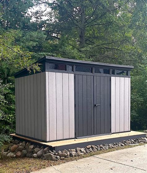 The smartly designed Keter Artisan 11′ x 7′ shed is the perfect blend of modern style and ruggedness that provides the ideal outdoor storage solution for your yard or garden. The innovative Duotech walls are not only highly durable and weather resistant they also feature an attractive wood-like texture and paintable surface.