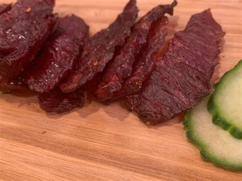 Keto beef jerky. Line a baking sheet with aluminum foil and place a wire rack over the foil. Lay the beef strips out in a single layer on the wire rack. Bake the beef in the preheated oven until dry, about 5 to 6 hours. Remove from the oven and allow to cool completely. Transfer in a container and refrigerate for up to 1 month. 