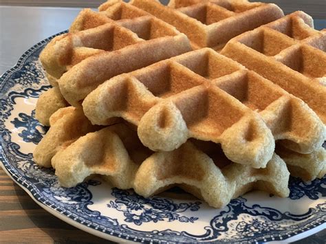 Keto waffle recipe. Add the almond flour and mix again. Next, stir in the cheese until well combined. Spray your waffle maker with non-stick spray and sprinkle a little cheese directly onto the griddle. Pour half of the mixture in and sprinkle with more cheese; close the lid and cook for 2-3 minutes or until your automatic timer goes off. 