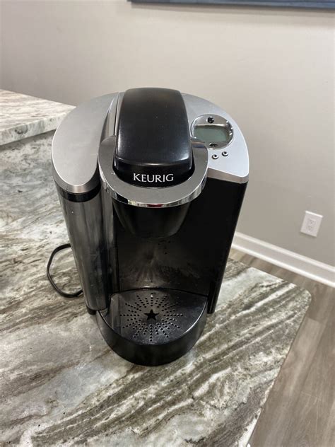 If you lack Keurig’s descaling solution, you can make your own by using white vinegar and water, following the same procedure. Make sure you use equal parts vinegar and water. This will descale the machine, freeing it of gunk and limescale/calcium buildup that’s causing you issues.. 
