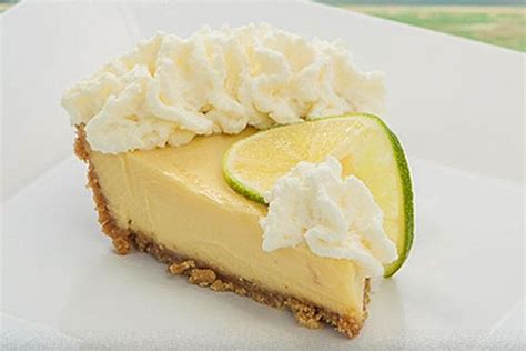 Key west lime pie. Stir well until the butter is melted. Add the key lime juice and zest if using. Pour the mixture over the crust. Place the pie into the fridge for 3 hours. Make the topping: beat heavy cream and vanilla until firm peaks form. Spoon the mixture into the piping bag and pipe onto the pie surface. Slice and serve. 