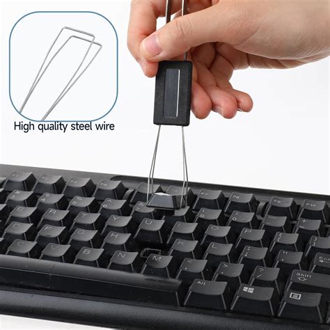 Keycap puller alternative.  The other keys are a bit trickier.  Ensuring Keycaps are Unharmed In...