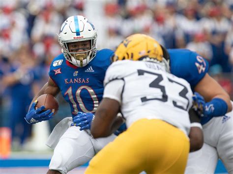 Oct 11, 2023 · October 11, 2023 8:30 AM Kansas beat writer Shreyas Laddha and former KU QB Carter Stanley discuss the Jayhawks' success running against the UCF Knights. In fact, Stanley compared Devin Neal's... . 
