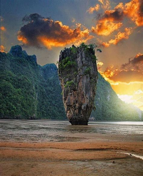 Khao phing kan island in thailand. A starring role in the 1974 James Bond movie The Man With the Golden Gun put the towering limestone islands of Ko Khao Phing Kan and the 66-foot-tall (20-meter) islet Ko Tapu firmly on Thailand's tourist trail. While boats aren't allowed to get too close to the islands, there are opportunities for sightseeing in the surrounding area. 