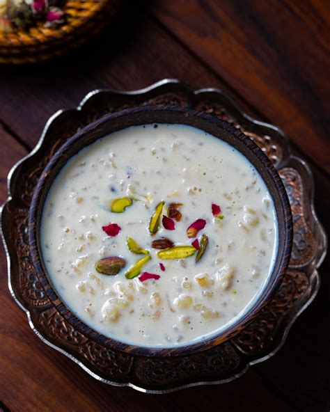 Kheer. 1) Take cooked rice in a saucepan. 2) Add milk and condensed milk. 3) Add chopped nuts and saffron. 4) Turn the heat on medium, mix well and let it simmer for 12-15 minutes or until it is thickened and becomes kheer consistency. Do stir occasionally to make sure that it is not sticking to the bottom and sides of the pan. 