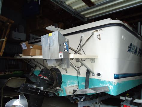 Garelick 71056 outboard motor bracket mounts to 8” side of aluminum plate, 11”side of plate mounts to swim platform. I steer it with a hydraulic cylinder and pump out of a 1960 Corvair that operated the convertible top, …. 