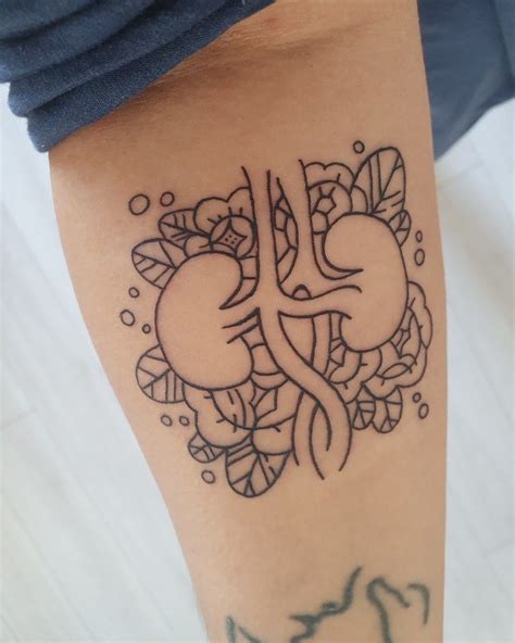 Kidney tattoo designs. Completely teal ribbons are symbols of ovarian cancer. The tattoo is often designed more femininely because the type of cancer affects only women. Of course, that does not mean that only women get these … 