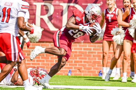 Kimani Vidal scores twice and Troy holds off Western Kentucky 27-24