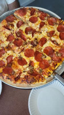 Kimara's pizza. Take-out pizza from locations like Pizza Hut and Dominoes can be left out unrefrigerated for up to 24 hours. Pizza tends to become dry and hard when it sits at room temperature for... 