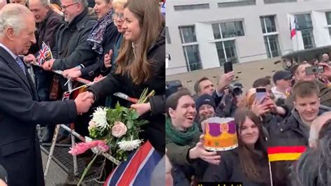 King Charles reacts as man offers him Burger King crown