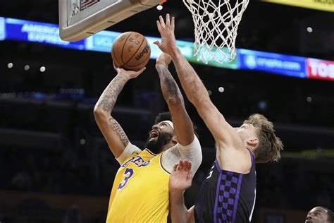Kings overcome LeBron’s triple-double, hold on in 4th quarter for 125-110 win over Lakers