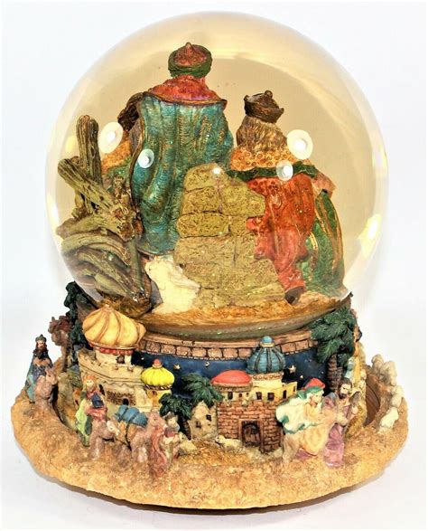 Kirkland musical water globe. Kirkland Musical Santa Water globe with revolving base, that plays "We wish you a Merry Christmas." #109619. We bought this many years ago for my mother-in-law. In good working order, but the water in the globe has turned a little yellowish. The box is showing some wear from storage and the Styrofoam packing is discolored. Priced accordingly ... 