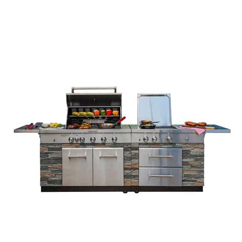 Kirkland Signature Stone Island 12 Burner Gas Grill 304 Stainless Steel Cooking Area; 118,000 Total BTUs Including 2 x 7000 BTUs Infared Top Sear Burners; 1,220 Sq In Total Cooking Surface Including Built-In 342 Sq In Griddle; LED Knobs; Grill Cover Included. 