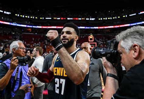 Kiszla: Nikola Jokic watches with Nuggets Nation as teammates carry him to within one victory of championship dream come true