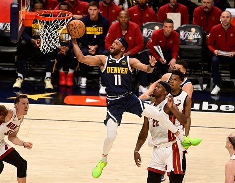 Kiszla: Nuggets meekly cower in shadow of center Nikola Jokic’s 41 points in NBA Finals loss to Heat