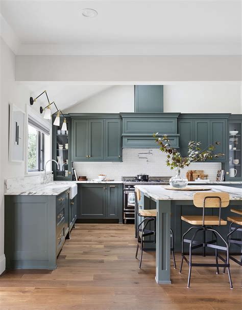 Kitchen cabinets paint. For cabinet durability, oil-based paint is the best. We have the cabinets sanded thoroughly, then use an oil-based primer. I prefer to have existing cabinets sprayed for a clean look, but they can ... 