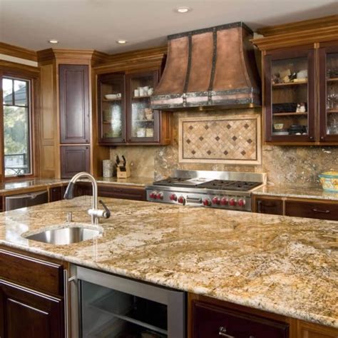 Kitchen granite countertop. 6 /11. While marble and granite can give off a cold look, wood, bamboo, or butcher block counters add warmth to a kitchen. Wood has the added benefit of being significantly cheaper than stone ... 