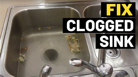 Kitchen sink won't drain. Easily unclog your kitchen sink with no harsh chemicals! Sink not draining? Stopped up drain? We show you how to unclog a double sink with garbage disposal t... 